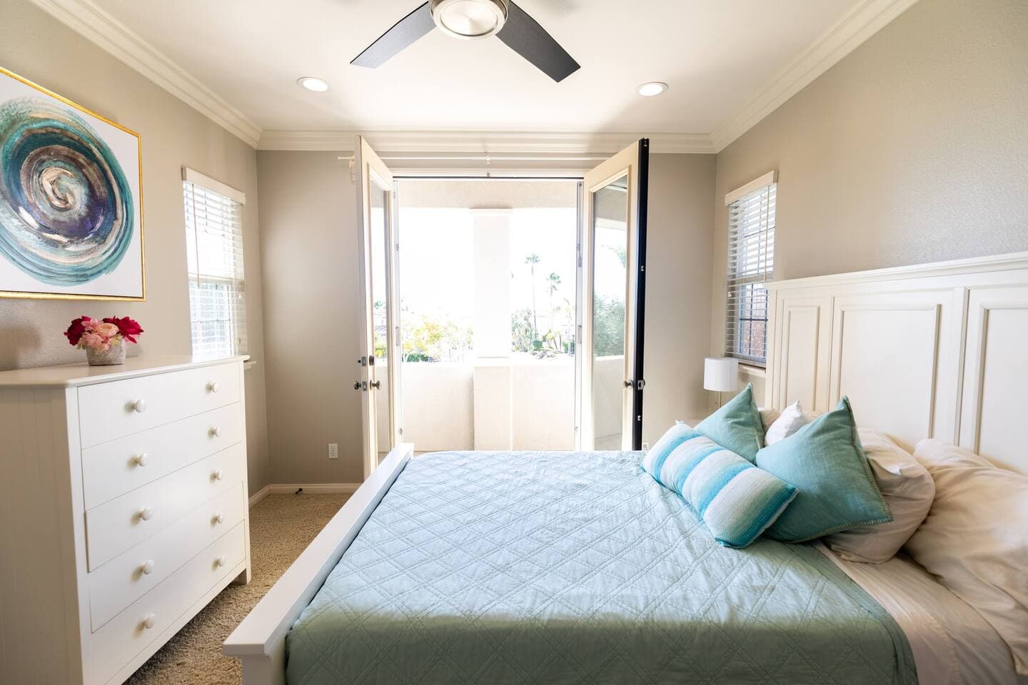 Queen size bed with attached full bathroom and walk in closet