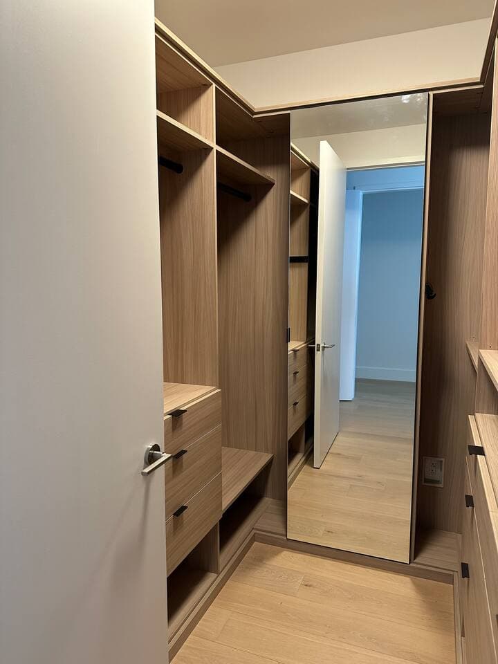 Custom built in closet in primary bedroom