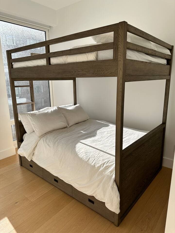 Bunk bed in third bedroom with trundle. All three beds are full sized.