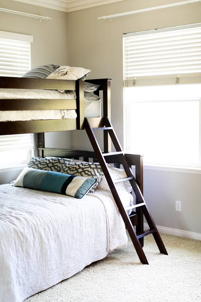 Twin over Full Bunk Bed with attached full bathroom.